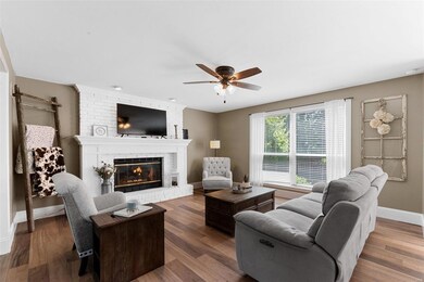 Relax in the family room with updated luxury vinyl