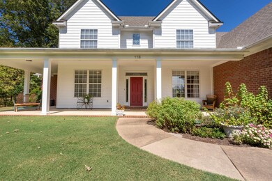 View of front of property featuring a porch and a 