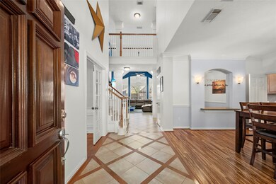 The bright and open foyer is inviting to all.