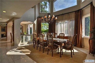 FORMAL DINING ROOM WITH CATHEDRAL CEILINGS