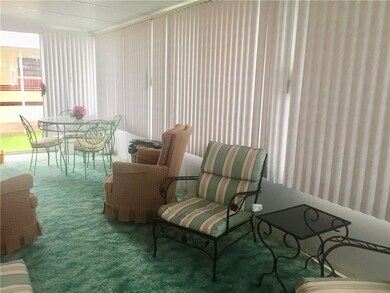 Enjoy friends in this roomy patio enclosure- rain 
