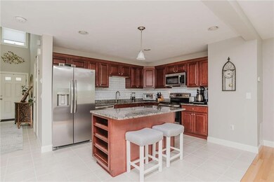 Kitchen with Breakfast Bar,overhead lighting, tile