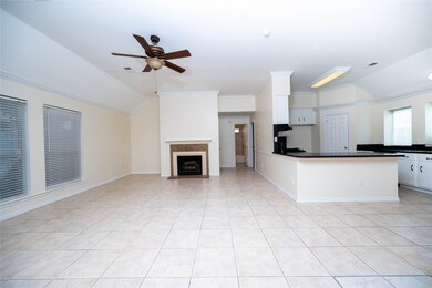 This home offers an open concept living and dining area and open concept kitchen