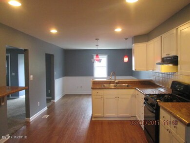 150 S Hudson St, Lowell, MI 49331 - photo 6