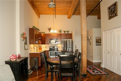 With 15ft ceilings and an open plan the unit has a