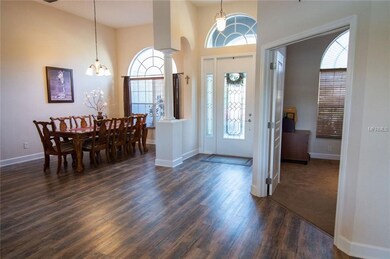 Front entrance with formal dining and office