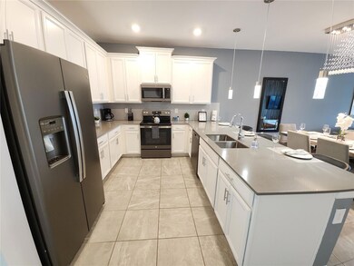 8885 Cabot Cliffs Dr unit 104, Davenport, FL 33896 - photo 5