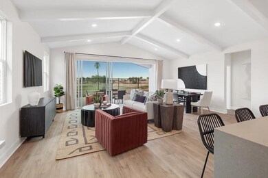 Great room with white-stained ceiling beams