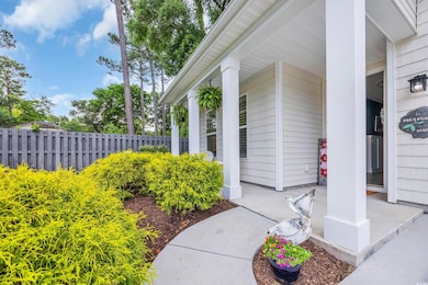 Doorway to property featuring fence