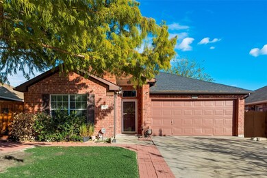 Ranch-style home featuring a garage