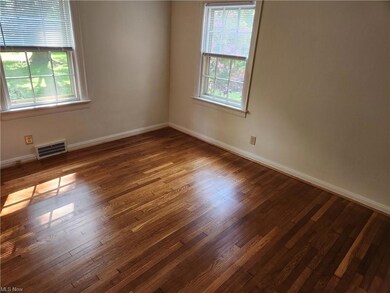 First Floor Bedroom With Refinished Wood Floors