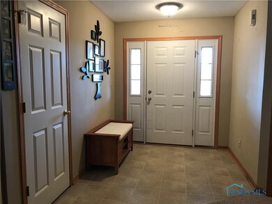 Welcoming, spacious foyer with coat closet