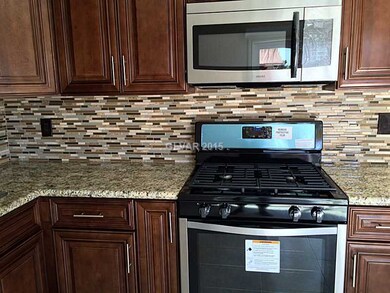 Kitchen. NEW STAINLESS  STOVE AND MICROWAVE
