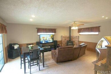 HUGE Den!  custom fireplace and another slider for