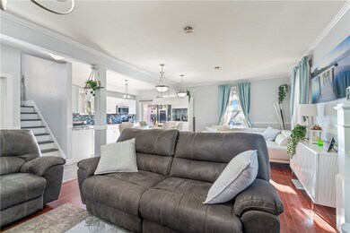 Open concept living room, kitchen and dinning room