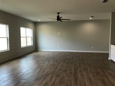 Open Concept Living Area with Shiplap focal wall, 
