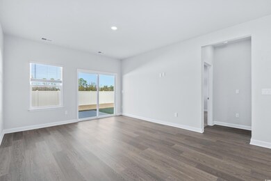 Spare room with dark hardwood / wood-style floorin