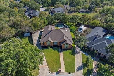 Custom home with pool on an amazing lot in a secluded, well-established neighborhood