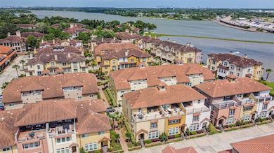 Stunning corner townhome located in a gated and wa