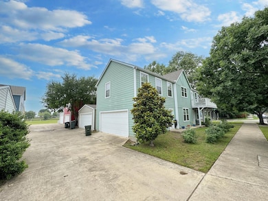 View of side of property with driveway