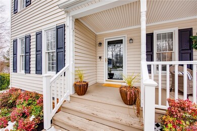 Front porch with a glass storm door.