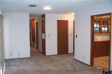 Viewing Hallway and foyer. Dining Room on the righ