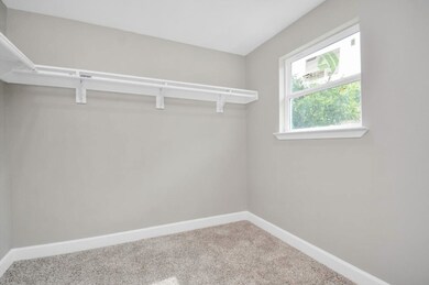 Primary Bedroom walk-in closet