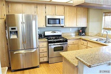 Newer granite countertops and stainless steel appl