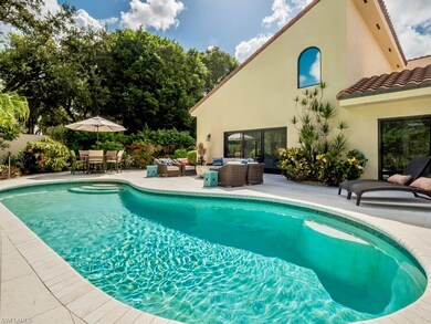 Sparkling pool in a pristine setting.