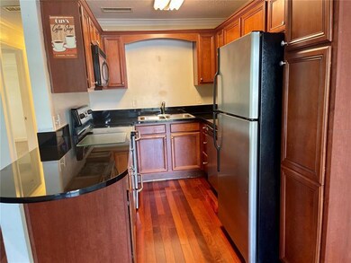 Kitchen with lots pretty wood cabinets