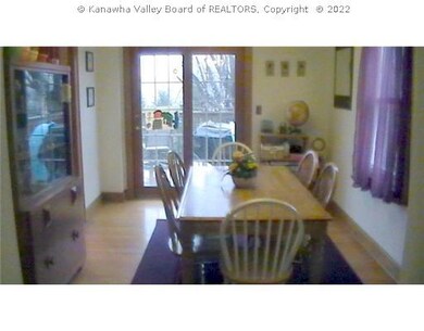 Dining Room. Formal dining with doors to large dec
