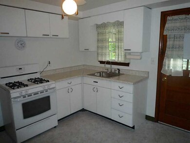 Kitchen. The crisp kitchen features newer applianc