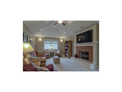 Vaulted ceilings and new carpet in this inviting g