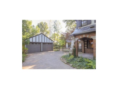 View toward backyard & private, brick paved courty