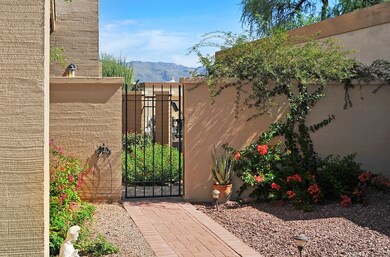 Charming gate at entry to backyard