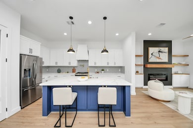 The kitchen, an integral part of this
home's open