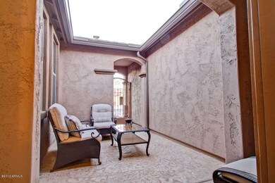 Courtyard-Stamped Concrete & Rain Gutter