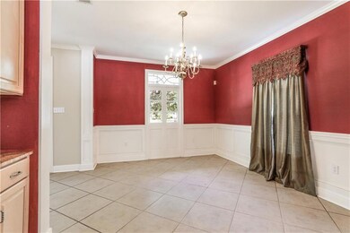 The dining room also features storage and a mirror