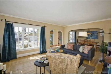 Warm, inviting living room with plenty of large wi