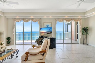 Living room with ceiling fan, light tile patterned