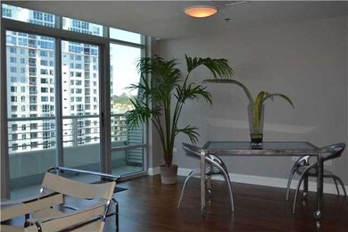 Dining area leading to balcony.