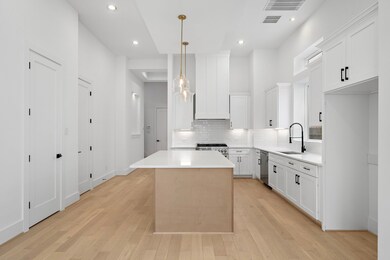 Another view of the impressive island kitchen with