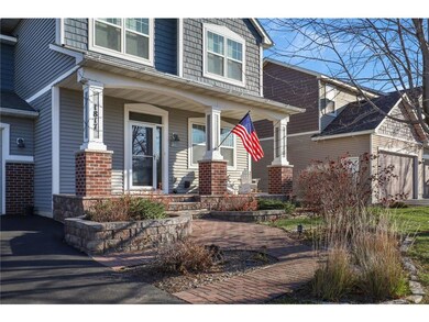 Beautifully paved front porch and landscaping.