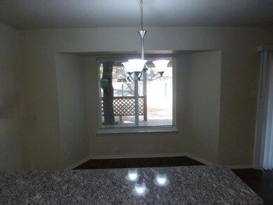 Unfurnished dining area featuring a chandelier, h