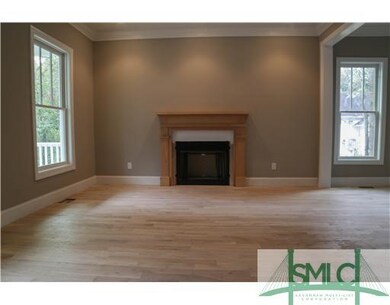 Living Room. Gas fireplace--still to be trimmed ou