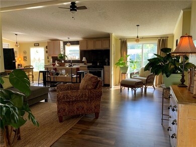 Open floor plan and vaulted ceiling in the living 
