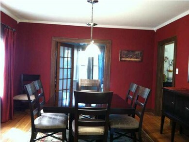 Formal Dining Room with french doors, crown moldin