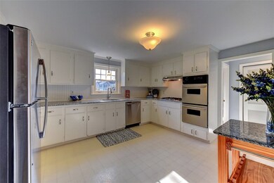 Granite and Stainless Kitchen with double ovens