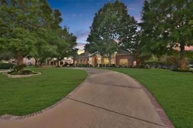 Beautiful curb appeal with a large circular driveway and custom landscape lighting.  This is the Russelton Floor Plan with the David Weekley Custom Classic Collection.