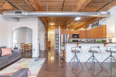 Open concept living invites easy flow for conversa